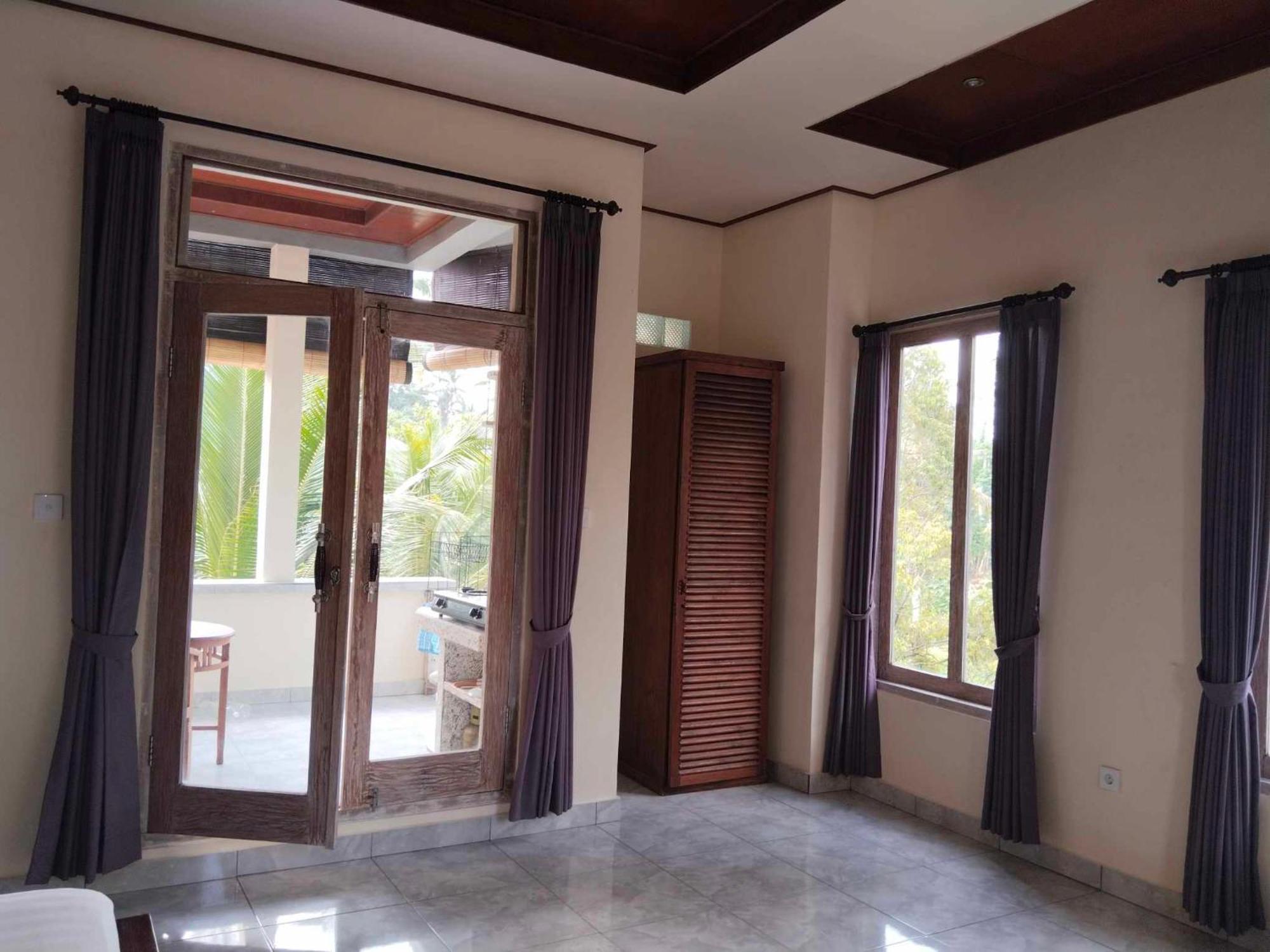 Wiguna House Apartment *