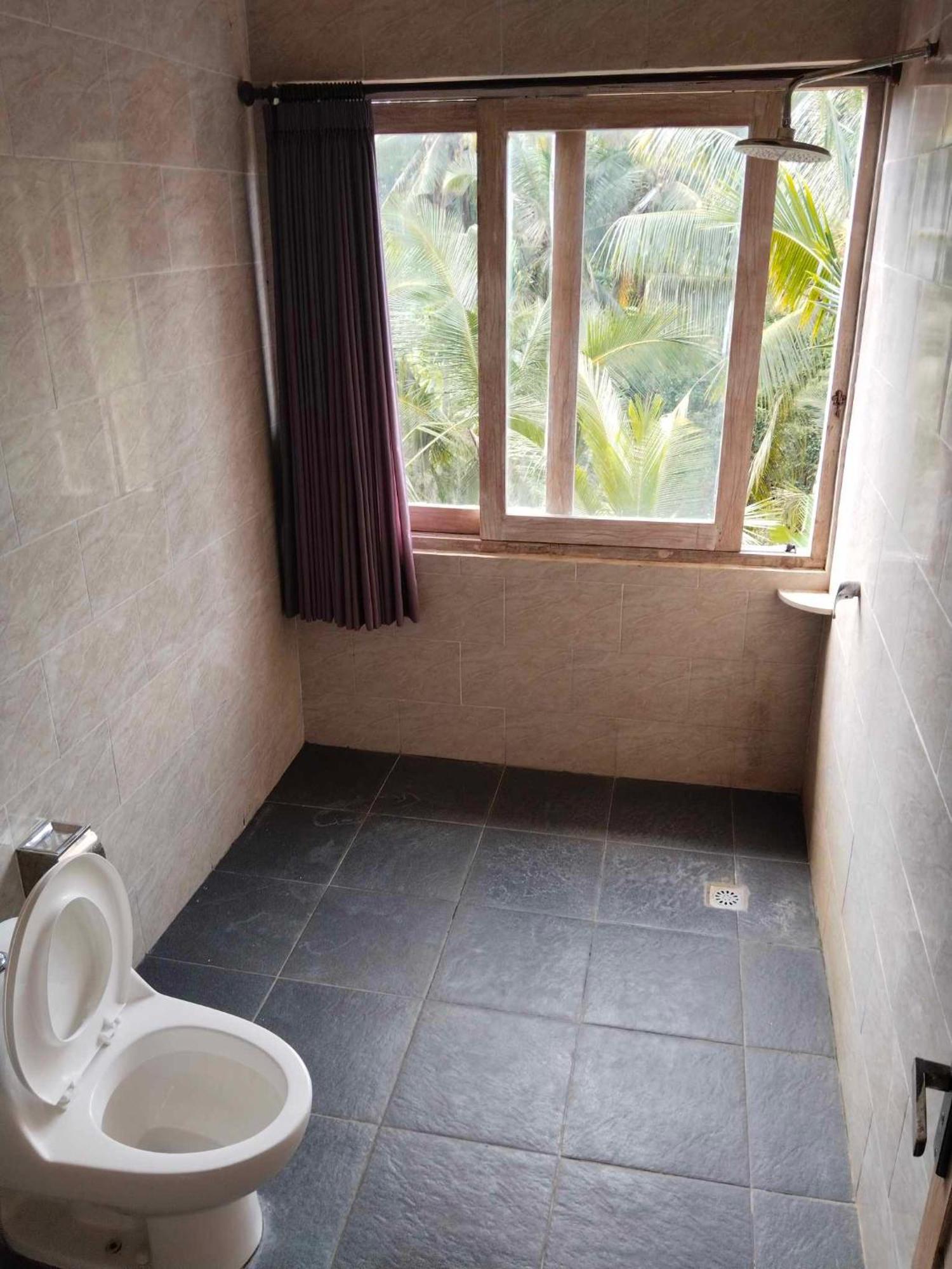 Wiguna House Apartment