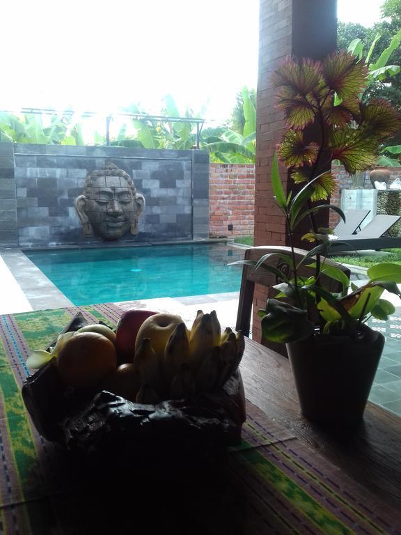 Ketut Kartika *